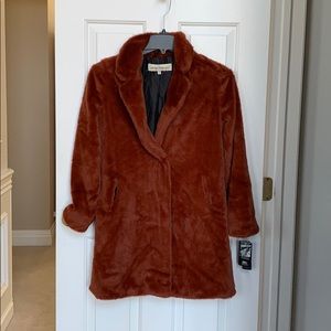 New faux rust fur jacket. Never worn.